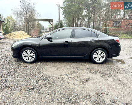 Черный Мазда 6, объемом двигателя 2 л и пробегом 264 тыс. км за 6990 $, фото 1 на Automoto.ua