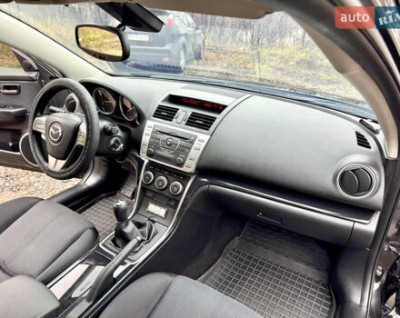 Черный Мазда 6, объемом двигателя 2 л и пробегом 264 тыс. км за 6990 $, фото 22 на Automoto.ua