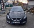 Черный Мазда 6, объемом двигателя 1.8 л и пробегом 173 тыс. км за 7000 $, фото 1 на Automoto.ua