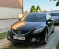 Черный Мазда 6, объемом двигателя 2 л и пробегом 124 тыс. км за 7200 $, фото 1 на Automoto.ua