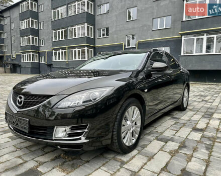 Черный Мазда 6, объемом двигателя 2 л и пробегом 253 тыс. км за 6500 $, фото 1 на Automoto.ua