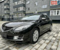 Черный Мазда 6, объемом двигателя 2 л и пробегом 253 тыс. км за 6500 $, фото 1 на Automoto.ua