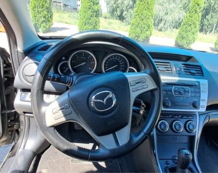 Черный Мазда 6, объемом двигателя 2 л и пробегом 140 тыс. км за 6500 $, фото 6 на Automoto.ua