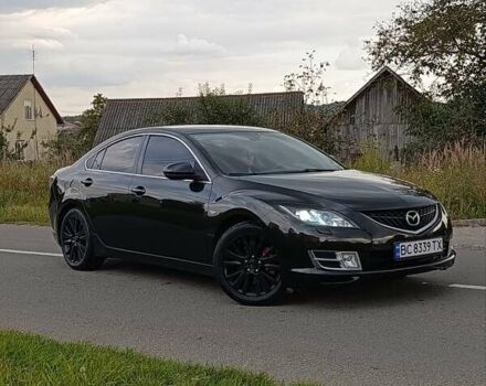 Черный Мазда 6, объемом двигателя 2 л и пробегом 212 тыс. км за 7899 $, фото 1 на Automoto.ua