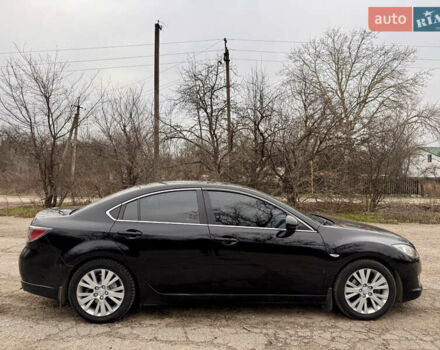 Черный Мазда 6, объемом двигателя 2 л и пробегом 258 тыс. км за 6900 $, фото 5 на Automoto.ua