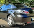 Черный Мазда 6, объемом двигателя 2.5 л и пробегом 200 тыс. км за 8300 $, фото 1 на Automoto.ua
