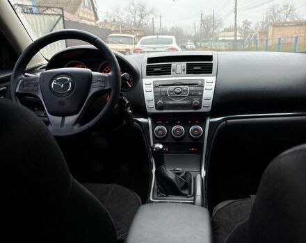 Черный Мазда 6, объемом двигателя 2 л и пробегом 280 тыс. км за 6500 $, фото 6 на Automoto.ua