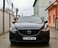 Черный Мазда 6, объемом двигателя 1.6 л и пробегом 158 тыс. км за 12300 $, фото 1 на Automoto.ua