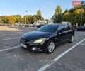 Черный Мазда 6, объемом двигателя 2 л и пробегом 234 тыс. км за 6400 $, фото 1 на Automoto.ua