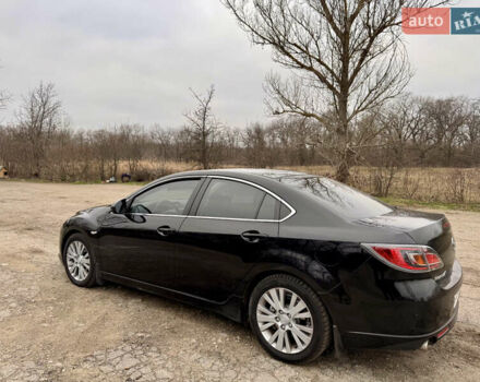 Черный Мазда 6, объемом двигателя 2 л и пробегом 258 тыс. км за 6900 $, фото 2 на Automoto.ua