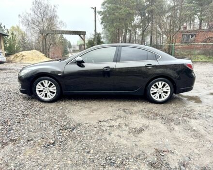 Черный Мазда 6, объемом двигателя 2 л и пробегом 264 тыс. км за 6890 $, фото 1 на Automoto.ua