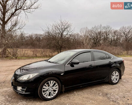 Черный Мазда 6, объемом двигателя 2 л и пробегом 258 тыс. км за 6900 $, фото 1 на Automoto.ua