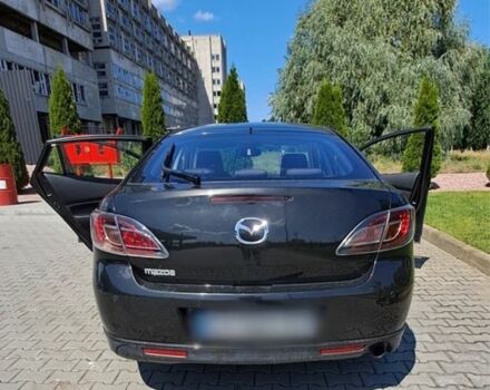 Черный Мазда 6, объемом двигателя 2 л и пробегом 140 тыс. км за 6500 $, фото 1 на Automoto.ua