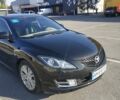 Черный Мазда 6, объемом двигателя 2 л и пробегом 180 тыс. км за 8000 $, фото 1 на Automoto.ua