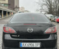 Чорний Мазда 6, об'ємом двигуна 1.8 л та пробігом 252 тис. км за 7300 $, фото 6 на Automoto.ua