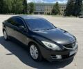 Черный Мазда 6, объемом двигателя 2 л и пробегом 290 тыс. км за 5999 $, фото 1 на Automoto.ua