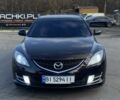 Черный Мазда 6, объемом двигателя 2 л и пробегом 180 тыс. км за 7700 $, фото 1 на Automoto.ua