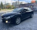 Черный Мазда 6, объемом двигателя 2 л и пробегом 265 тыс. км за 5700 $, фото 1 на Automoto.ua
