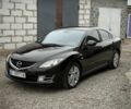 Черный Мазда 6, объемом двигателя 2 л и пробегом 263 тыс. км за 5850 $, фото 1 на Automoto.ua