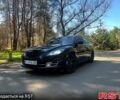 Черный Мазда 6, объемом двигателя 2.5 л и пробегом 254 тыс. км за 7999 $, фото 1 на Automoto.ua