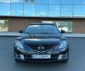 Черный Мазда 6, объемом двигателя 2 л и пробегом 251 тыс. км за 5600 $, фото 1 на Automoto.ua