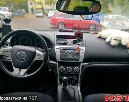 Черный Мазда 6, объемом двигателя 2 л и пробегом 140 тыс. км за 6990 $, фото 3 на Automoto.ua