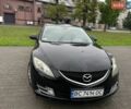 Черный Мазда 6, объемом двигателя 1.8 л и пробегом 225 тыс. км за 6000 $, фото 1 на Automoto.ua