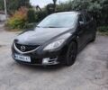Черный Мазда 6, объемом двигателя 2 л и пробегом 230 тыс. км за 7335 $, фото 1 на Automoto.ua