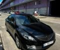 Черный Мазда 6, объемом двигателя 2.5 л и пробегом 260 тыс. км за 6200 $, фото 1 на Automoto.ua