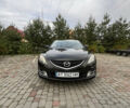 Черный Мазда 6, объемом двигателя 2 л и пробегом 174 тыс. км за 6600 $, фото 1 на Automoto.ua
