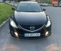 Черный Мазда 6, объемом двигателя 1.8 л и пробегом 275 тыс. км за 5990 $, фото 1 на Automoto.ua