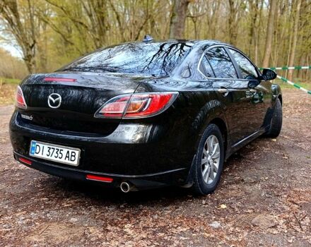 Черный Мазда 6, объемом двигателя 1.8 л и пробегом 196 тыс. км за 6500 $, фото 1 на Automoto.ua
