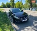 Черный Мазда 6, объемом двигателя 2 л и пробегом 203 тыс. км за 6500 $, фото 1 на Automoto.ua