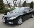 Черный Мазда 6, объемом двигателя 2 л и пробегом 258 тыс. км за 6890 $, фото 1 на Automoto.ua
