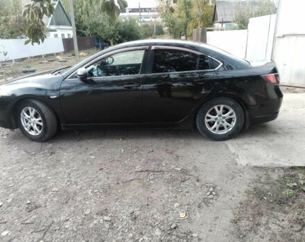 Чорний Мазда 6, об'ємом двигуна 1.8 л та пробігом 186 тис. км за 7500 $, фото 6 на Automoto.ua