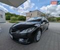 Черный Мазда 6, объемом двигателя 2.18 л и пробегом 290 тыс. км за 6350 $, фото 1 на Automoto.ua