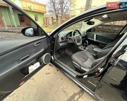 Чорний Мазда 6, об'ємом двигуна 1.8 л та пробігом 190 тис. км за 5999 $, фото 12 на Automoto.ua