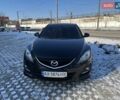 Черный Мазда 6, объемом двигателя 1.8 л и пробегом 131 тыс. км за 8000 $, фото 1 на Automoto.ua