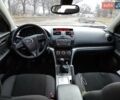Черный Мазда 6, объемом двигателя 2 л и пробегом 157 тыс. км за 9200 $, фото 1 на Automoto.ua