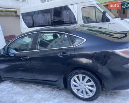 Черный Мазда 6, объемом двигателя 2.2 л и пробегом 340 тыс. км за 6700 $, фото 1 на Automoto.ua