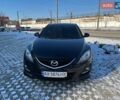 Черный Мазда 6, объемом двигателя 1.8 л и пробегом 132 тыс. км за 7500 $, фото 1 на Automoto.ua