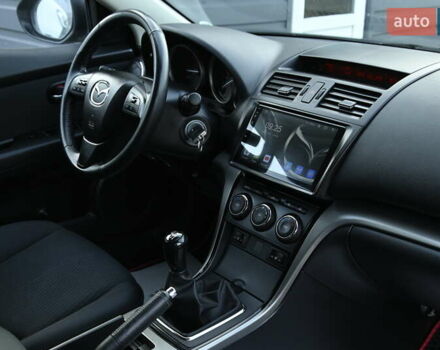 Черный Мазда 6, объемом двигателя 2.2 л и пробегом 321 тыс. км за 7500 $, фото 32 на Automoto.ua