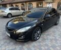 Чорний Мазда 6, об'ємом двигуна 2 л та пробігом 257 тис. км за 8093 $, фото 1 на Automoto.ua