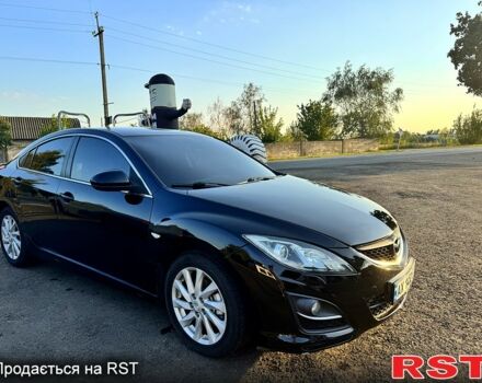 Черный Мазда 6, объемом двигателя 2 л и пробегом 191 тыс. км за 7700 $, фото 1 на Automoto.ua