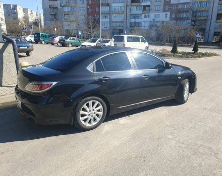 Черный Мазда 6, объемом двигателя 2 л и пробегом 195 тыс. км за 9300 $, фото 1 на Automoto.ua