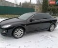 Черный Мазда 6, объемом двигателя 2 л и пробегом 180 тыс. км за 7700 $, фото 1 на Automoto.ua