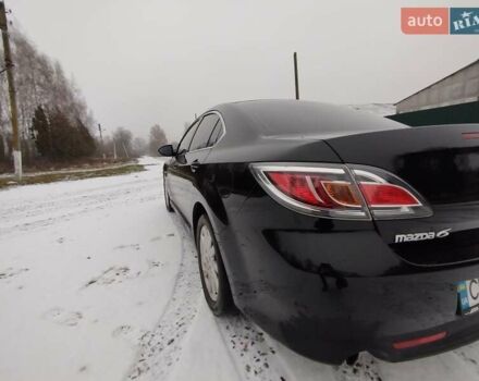 Черный Мазда 6, объемом двигателя 2 л и пробегом 180 тыс. км за 7800 $, фото 1 на Automoto.ua