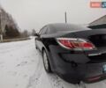 Черный Мазда 6, объемом двигателя 2 л и пробегом 180 тыс. км за 7800 $, фото 1 на Automoto.ua