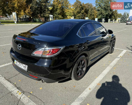Черный Мазда 6, объемом двигателя 1.8 л и пробегом 195 тыс. км за 8000 $, фото 4 на Automoto.ua