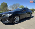 Черный Мазда 6, объемом двигателя 2.19 л и пробегом 170 тыс. км за 12500 $, фото 1 на Automoto.ua